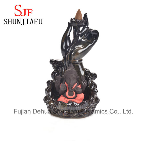 Ceramic Ganesh Incense Burner Sitting on The Lotus Stage