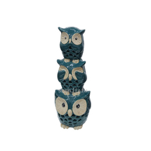 tunning ceramic ornament featuring blue three owls of diminishing size stacked on top of each other