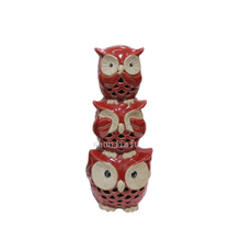 tunning ceramic ornament featuring red three owls of diminishing size stacked on top of each other